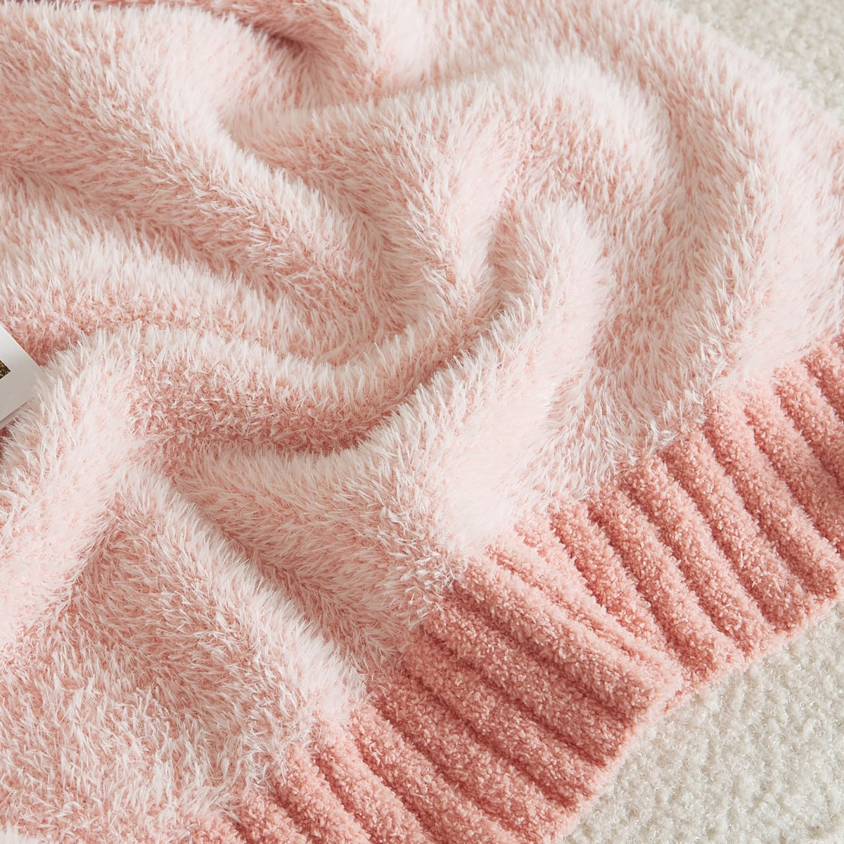 WESHIONGOO Faux Fur Throw Blanket Soft Feather Yarn Knitted Blanket 50x60 Inches Lightweight Breathable Throw for Bed, Couch, Travel - Machine Washable Cozy Home Decor Gift (Pink)