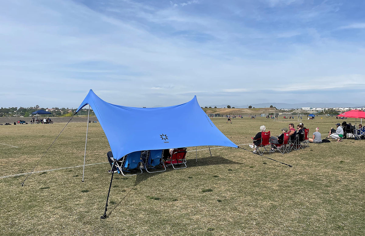Neso Sidelines Grande Sports Tent - Lightweight and Portable Sun Shelter and Shade Tent for Outdoor Activities - Patented Reinforced Corners - UPF 50+ - 7ft Tall, 11 x 4.5 ft - Periwinkle Blue